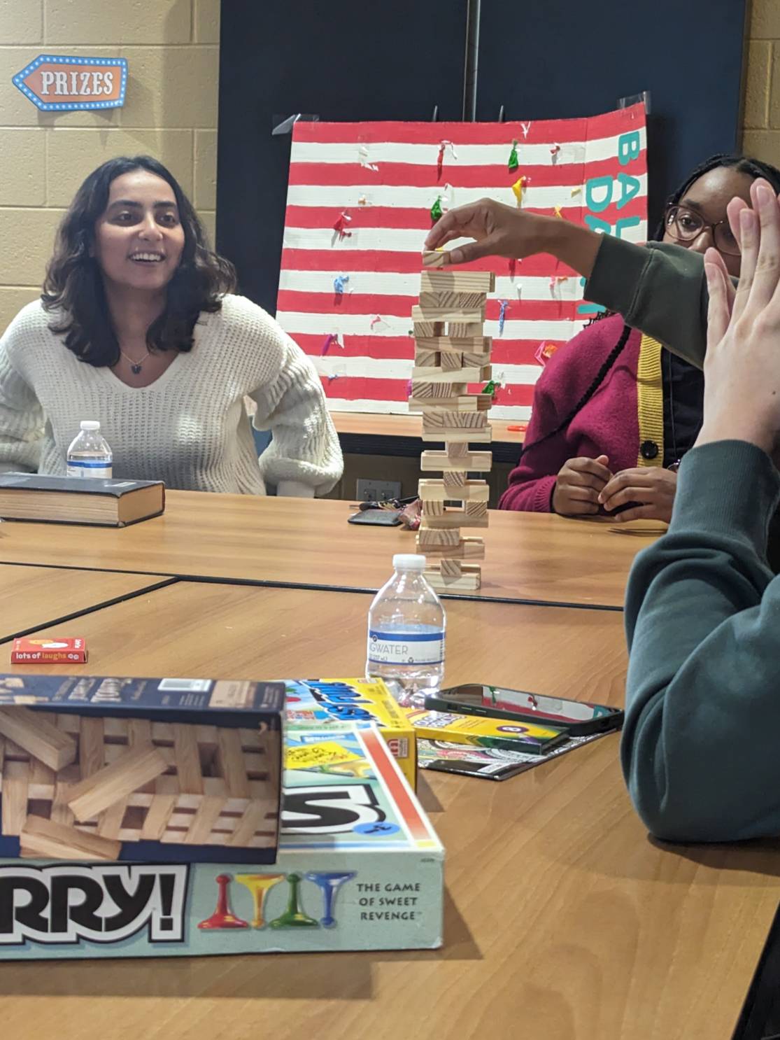 conversation memebers playing jenga